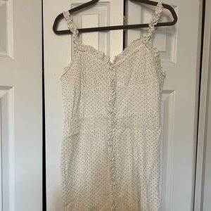 White dress with gray dots.